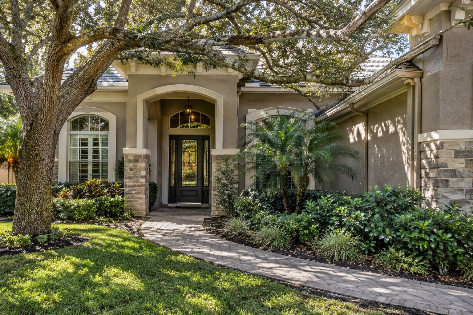 A shaded front entry of a Florida home, illustrative